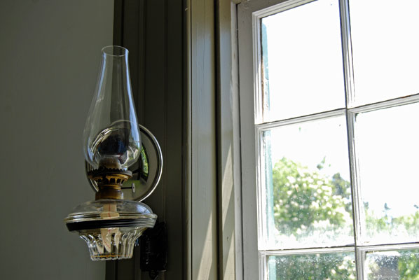 an oil lamp wall sconce