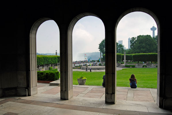 looking out from inside one of the stone pavilion towards the mist rising from the Horseshoe Falls